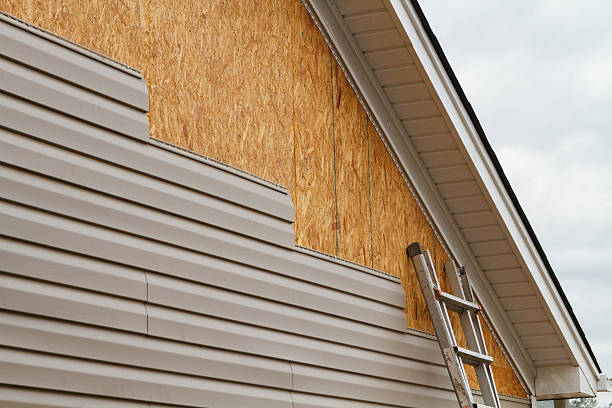 Professional Siding Contractor technician working in Coal Township, PA
